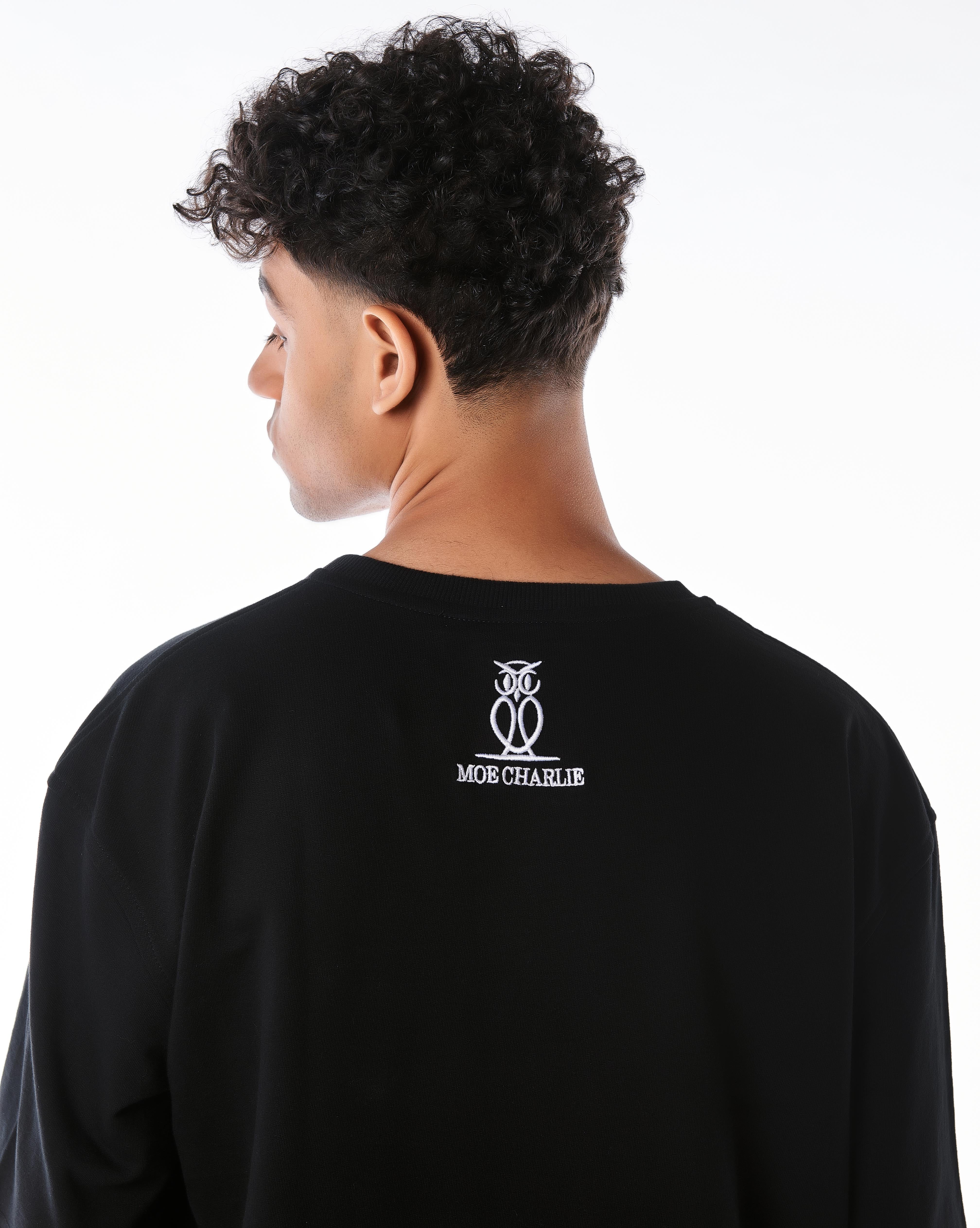 Rücken-Detailaufnahme MOE CHARLIE Pink Passion T-Shirt, Eulen-Logo-Stickerei am Nacken, Nahaufnahme